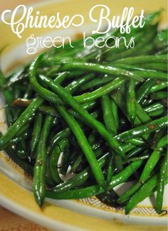 green beans on a plate with chinese writing