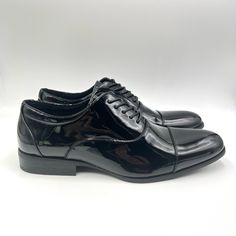 Stacy Adams Men's Gala Glossy Black Patent Cap Toe Lace Up Dress Shoes. Men's Size 12 Regular / Medium Width. Condition: New Without Box. New To Poshmark? Sign Up Using Invite Code: Tentoday For $10 Off Your Purchase! Black Plain Toe Oxfords For Party, Black Plain Toe Dress Shoes For Party, Classic Fitted Synthetic Oxfords, Black Synthetic Dress Shoes For Business Casual, Fitted Plain Toe Dress Shoes For Party, Fitted Patent Leather Lace-up Oxfords, Sleek Fitted Plain Toe Oxfords, Black Cap Toe Dress Shoes For Formal Occasions, Fitted Almond Toe Oxfords For Party