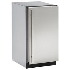 a silver refrigerator freezer sitting on top of a white floor next to a wall