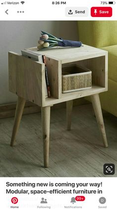 a small wooden table with a basket on it