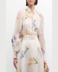 Zimmermann "Natura" blouse featuring a floral motif in a linensilk blend     Stand collar    Long bishop sleeves; smocked cuffs    Slim fit    Hem sits at the hip    Buttonfront     Linen/silk    Unlined    Dry clean    Imported Floral Dress With Sleeves, Fashion 60s, Summer Cruise, Military Style Coats, Skater Dresses, Casual Evening, Long Maxi Skirts, Cocktail Evening Dresses, Stretchy Dress