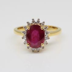 THE RUBY 1 PEC. – 2 . 58 CARATS. WITH DIAMONDS 16 PECS. – 0 . 18 CARAT. 18 K.- 750 YELLOW GOLD RING 4 . 60 GRAMS. WIDTH 1 . 40 X LENGTH 2 . 00 CM. ANY SIZE IS AVAILABLE PLEASE CONTACT FOR MORE INFORMATION Classic 14k Gold Ruby Ring With Round Stone, Gold Victorian Ruby Ring With Single Cut Diamonds, Luxury 14k Gold Round Ruby Ring, Yellow Gold Ruby Ring With Vvs Clarity, Round Cut, Antique 14k Gold Ruby Ring With Multi-stone