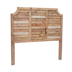 a wooden headboard made out of wood planks