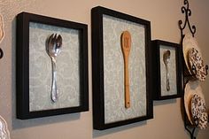 three framed pictures with spoons, forks and napkins hanging on the wall next to each other