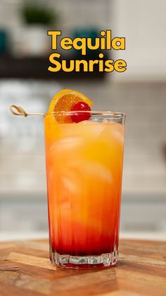 the tequila sunrise cocktail is garnished with an orange slice