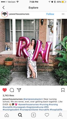 a woman holding up the letter r in front of her house with pink balloons attached to it