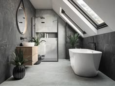 a bathroom with a skylight and a large bathtub in the middle of it