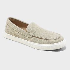 •Gabe canvas sneakers •Cushioned footbed •Cotton lining and upper •Closed round toe •Slip-on style •Medium width Description From casual office days to hanging out with friends, take on any occasion in cool style with these Gabe Canvas Sneakers from Goodfellow & Co. These canvas sneakers boast a cushioned footbed with soft cotton insole, lining and upper for keeping your feet in absolute comfort when you're out and about. Slip them on with shorts and a tee or a jeans and button-down shirt to cre Summer Streetwear Slip-on Sneakers With Cushioned Footbed, Casual Cushioned Slip-ons For Fall, Fabric Sneakers With Speckled Midsole And Round Toe, Casual Beige Canvas Shoes With Rubber Sole, Fabric Slip-on Sneakers With Vulcanized Sole, Flat Canvas Shoes With Vulcanized Sole, Casual Flat Slip-ons With Textured Sole, Beige Cotton Low-top Canvas Shoes, Flat Textile Canvas Shoes With Vulcanized Sole