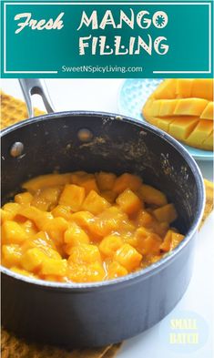 fresh mango filling in a skillet with sliced mangos on the side and text overlay