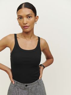 Top notch. The Calie is a tank top with a scoop neckline. It gives you a little shape in the areas where you might want it. It's soft and stretchy for an extra comfortable feel. Fitted Tank Top, Crop Rotation, Swimming Outfit, Friends With Benefits, Long Jeans, Vintage Inspired Dresses, New Stuff, Inspired Dress, New Tops