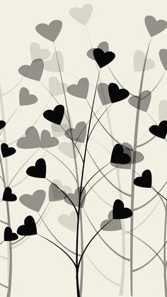 a tree with many hearts on it in front of a white background and black branches