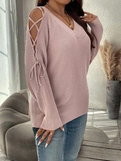 Embrace the laid-back charm with its loose fit and raglan sleeves, providing a relaxed yet trendy look. The V-neck adds a touch of sophistication, while the lace-up details elevate the overall design. Crafted from 100% Acrylic knitwear, this Tie Up Drop Shoulder Sleeve Pullover Sweater ensures a cozy feel with a slight stretch for flexibility. Whether you're lounging or stepping out, this pullover promises to be your go-to choice for effortless fashion. Experience the epitome of casual elegance Drop Shoulder Sleeve, Cardigan Plus Size, Stretches For Flexibility, Comfy Jumpsuits, Sleeves Sweater, Crochet Halter Tops, Chunky Knit Cardigan, Boutique Brands, Beige Sweater