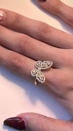 Elevate your style with our stunning 14-karat gold-plated butterfly ring, adorned with sparkling cubic zirconia stones. This elegant piece is designed for those who love a mix of dainty and fashionable jewelry. Perfect for adding a touch of nature-inspired beauty to your look, this ring is versatile enough for everyday wear or special occasions. Its affordable luxury makes it a great gift for loved ones or a trendy addition to your own jewelry collection. Shop now to enjoy a blend of elegance and affordability! Follow us on instagram @jewelrybyana for more trending jewelry ideas. Gold Butterfly Ring, Ring Butterfly, Astoria Ny, Animal Ring, Animal Rings, Trendy Ring, Fashionable Jewelry, Butterfly Ring, Cz Jewelry