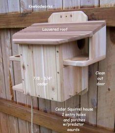 a bird house with instructions to build it on the side of a wooden fenced in area