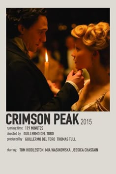 a movie poster for the film crimson peak, featuring a man and woman looking at each other