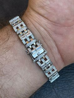 Men's 8.5" long 11.5mm wide bracelet
Gorgeous unique square link. Nice mix of baguette and round stones. SUPER ICY
Custom one of a kind design...don't get the same cuban link everyone else has!
***Also available in 7" If you need a shorter bracelet please leave a message at the CHECKOUT screen where it says "Message to Seller". Tell us the size you need in that space. If no message we ship 8.5" as default
 
Heavy 38 grams.
 
14.2ct man made diamonds...not cheap CZ
You can&rsquo Mens Bracelet Designs, Man Bracelet, 10k Gold Chain, Red Stone Ring, Colored Engagement Rings, Baguette Diamonds, Wide Bracelet, Man Made Diamonds, Moissanite Earrings