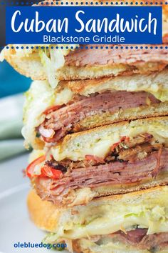 a close up of a sandwich on a plate with the words cuban sandwich blackstone griddle