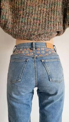 the back view of a woman's jeans