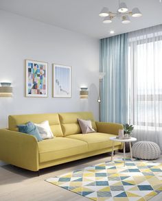 a living room with a yellow couch and blue drapes on the window sill