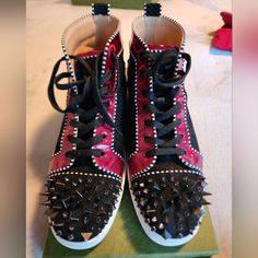 Christian Louboutin Men's Mid Top Special Edition Red/Black With Suede W/Spikes Sz 42 11.5 Christian Louboutin Men, Mid Top, Christian Louboutin Shoes, Mens Shoes Sneakers, Christian Louboutin, Shoes Sneakers, Men's Shoes, Black And Red, Sneakers