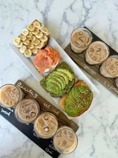 an assortment of food items displayed on serving trays