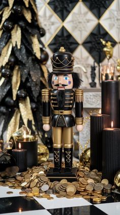 a nutcracker figurine sitting on top of a pile of gold coins