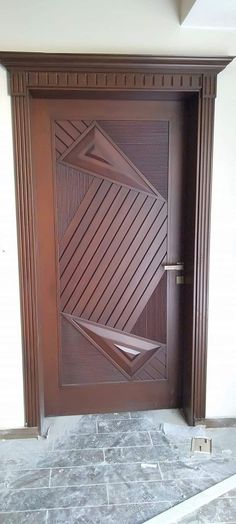 a wooden door with an intricate design on it