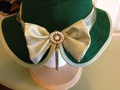 "CARRIAGE DRIVING HELMET HAT/COVER. Helmet not included Nothing in stock ready to ship Each hat is individually made to your specifications. You pick your colors and decorations. Decorations include a handmade ribbon or fabric flower, or silk flower; a feather pin with either a button or jewelry centerpiece; and hatband of netting, ribbon or fabric. Brim has a \"Soft Edge\" - no wire. Wire can be added upon request. *Photos are examples only. Prices start at $125.00 The hats attach to your helme Horse Driving, Driving Horses, Carriage Driving, Adult Tricycle, Horse Harness, Half Helmets, Helmet Hat, Helmet Covers, Horse Equipment