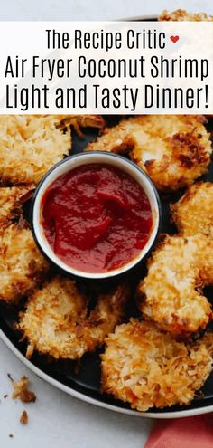 the recipe for air fryer coconut shrimp is served on a plate with ketchup