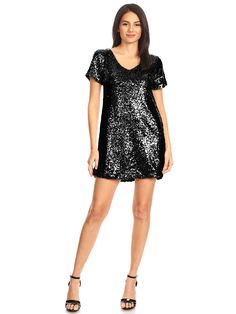 This Sequin Glitter Short Sleeve V Neck Dress will surely make you stand out from the crowd. Featuring a V-neckline and sequin glitter fabric, this dress is perfect for any special occasion. The lightweight material and short sleeves add a breathable and comfortable feel. Look your best while feeling your best in this stunning dress. 100% Polyester Imported Pull On closure Hand Wash Only Glitter Shorts, Sequin Short, Sequin Party Dress, Sequin Shorts, Shine Bright Like A Diamond, Mini Shirt Dress, 50's Dress, Black Sequins, Stunning Dresses