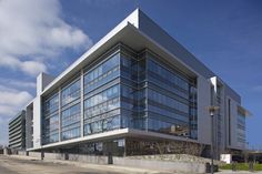 an office building with many windows on the outside