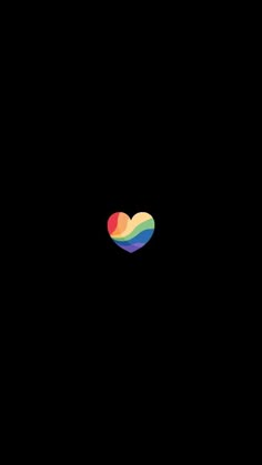 a rainbow heart on a black background