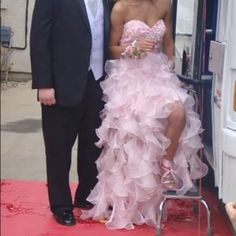 Photos Really Don’t Do This Dress Justice- Gorgeous Light Pink Dress By Sherri Hill In A Size 2. This Dress Features A Shorter Skirt Underneath Layers And Layers Of Chiffon Floor Length Ruffles. Sequined Bodice, Sweetheart Neckline, And Back Zipper. My Daughter Is 5’5” And Was Wearing Approx A 4” Heel With This And It Was Perfect! Purchased For $350 And Only Worn A Couple Hours. Will Ship Within 24 Hours Of Purchase Sherri Hill Pink Dress, Pink Ruffle Dress, Senior Prom Dresses, Light Pink Dress, Senior Prom, Sherri Hill Dresses, Pink Ruffle, Sherri Hill, Anemone