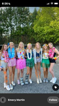 a group of young women standing next to each other