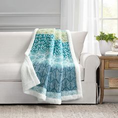 PRICES MAY VARY. Sherpa Boho Chic: Add some bohemian charm to your space with our Lush Decor Bohemian Stripe Sherpa Blanket. The front quilted design features a symphony of artistic patterns and a kaleidoscope of exquisite hues, with a cozy and soft white sherpa reverse. Cozy Throw: The printed patchwork front is a tapestry of stories waiting to be told. This throw is a perfect layering piece for your bed, couch, or chair. Show off your personality and add it to your modern, boho, or maximalist Aesthetic Patterns, Over The Couch, Lush Decor, Blue Throws, Bohemian Colors, Striped Throw, Sherpa Throw Blankets, Colorful Patterns, Dining Room Bench