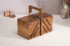 a wooden box sitting on top of a table