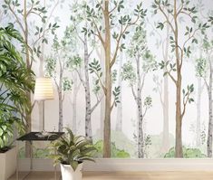 a living room with a wall mural and potted plant