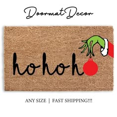 a door mat with the words hohoh and a christmas ornament on it