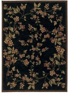 a black rug with flowers and leaves on it