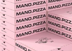 several pizza boxes stacked on top of each other with the word mano written on them