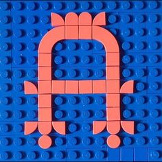 the letter d is made out of legos