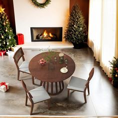 a dining room table with four chairs around it and a fireplace in the back ground