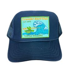 Our favorite Navy trucker hat adorned with the rising star mascots of surf comps all over the world! Pick your favorite team rider and get ready to shred, slide, glide and rip on waves of all kinds. The Surf Cocks and Lady Surf Cocks walk the log with confidence and classic style! The short boarding Duck Divers are known for dipping under big waves on stubby fish and emerging on glorious airs, whapping and quacking and spraying everyone in their wake! The gentle Turtle Rollers take the big ones Malibu Surf, Surf Hats, Patch Hats, Wetsuit Men, Surf Gear, Womens Wetsuit, Beach Gear, Gear Bag, Big Waves