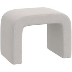 a white stool that is shaped like an arch with one foot on the ground and two legs down