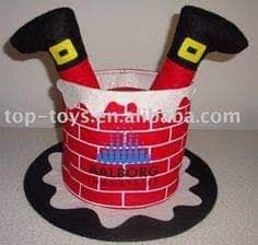 a red and white basket with two black ears on it's head, sitting on top of a table