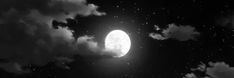 the moon is shining brightly in the night sky with clouds and stars all around it