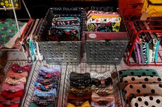 the baskets are filled with various items for sale