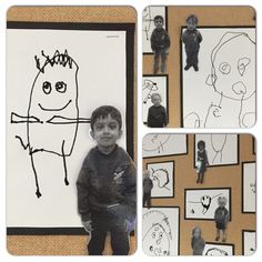 a child is standing in front of some drawings