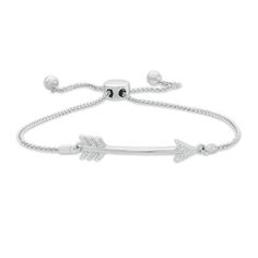 Aim true in fashion with this chic diamond bolo bracelet. Created in sterling silver, this sculpted design features a sparkling diamond-adorned arrowhead and tail feathers. Radiant with 1/20 ct. t.w. of diamonds and a brilliant buffed luster, this wheat chain bracelet adjusts up to 9.5 inches in length and secures with a bolo clasp and ball ends. Bolo Bracelet, Peoples Jewellers, Tail Feathers, Sparkle Diamonds, White Metal, Diamond Clarity, Diamond Stone, Bracelet Designs, In Fashion