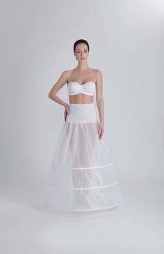 Lightweight crinoline and hoops petticoat with tailed layers for an aline wedding dress. Made with bones. The petticoat comes in ivory color. Waistline closing - Elastic Band Skirt diameter at the bottom: 270 cm The petticoat structure: J-153C Pettıcoat, 3 Hoops, 270 cm This petticoat is made with bones only (no layer of crinoline) and it's recommended only for dresses with heavy skirts. Our model designed for A line model wedding dresses provides the look you want. Brand new, high quality crino Crinoline Wedding Dress, Hoop Petticoat, Model Wedding, Heavy Dresses, Aline Wedding Dress, Bridal Ball Gown, Gown Bridal, Wedding Hall, Southern Belle